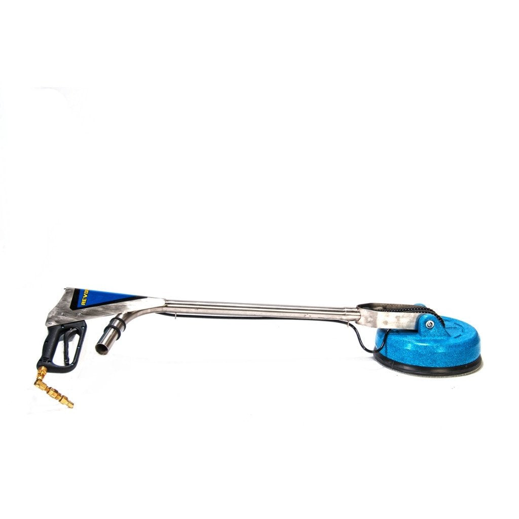 Revolution Tile & Grout Cleaning Machine laid down on the floor.
